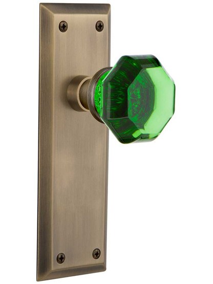 New York Door Set with Colored Waldorf Crystal Glass Knobs Emerald in Antique Brass.
